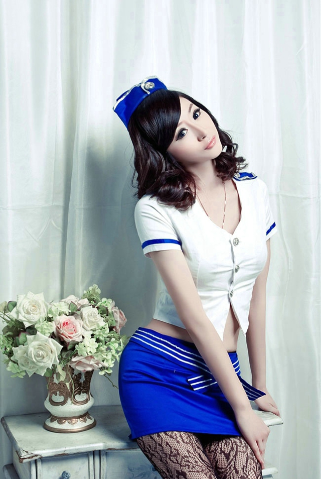 迷情花纹黑丝美女私房妖娆美腿制服写真